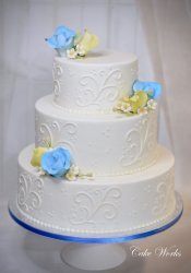 Simple scroll stencil with sugar flowers