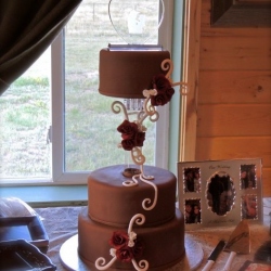 Chocolate Tiers with Red Roses White Scrolls