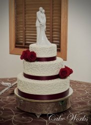 Pretty Buttercream Scrolls and Red Roses