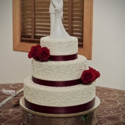 Pretty Buttercream Scrolls and Red Roses