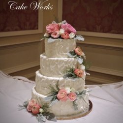 Rustic Buttercream and Cascade of Garden Flowers