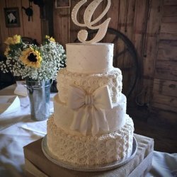 Elegant Buttercream Rosettes and Quilt