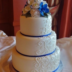 white-on-white-scrolls-and-royal-blue-ribbon-large