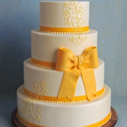 Yellow Bow on Buttercream Icing